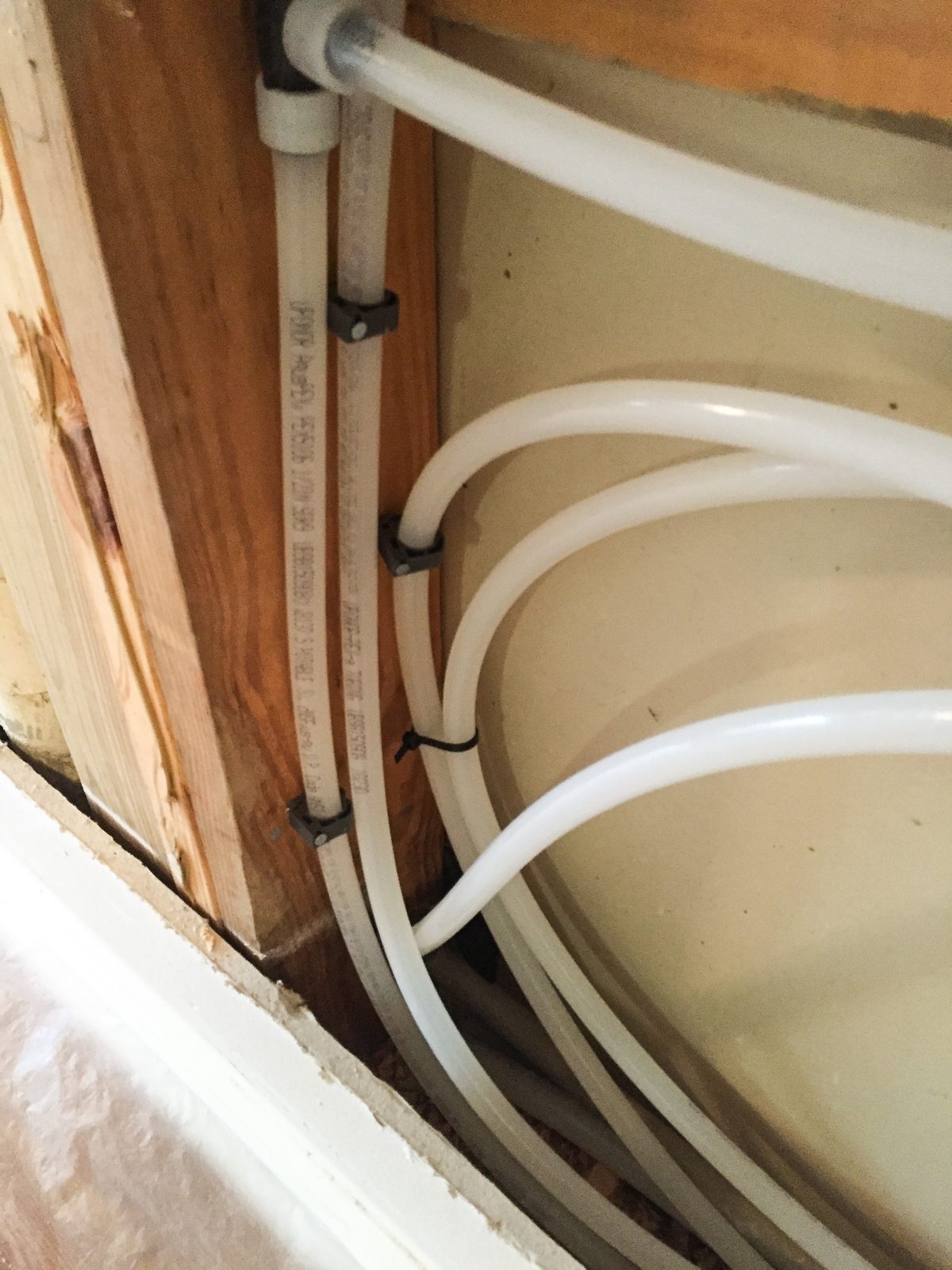 Tustin whole house repipe photo showing pipe replacement planning by Repipe OC